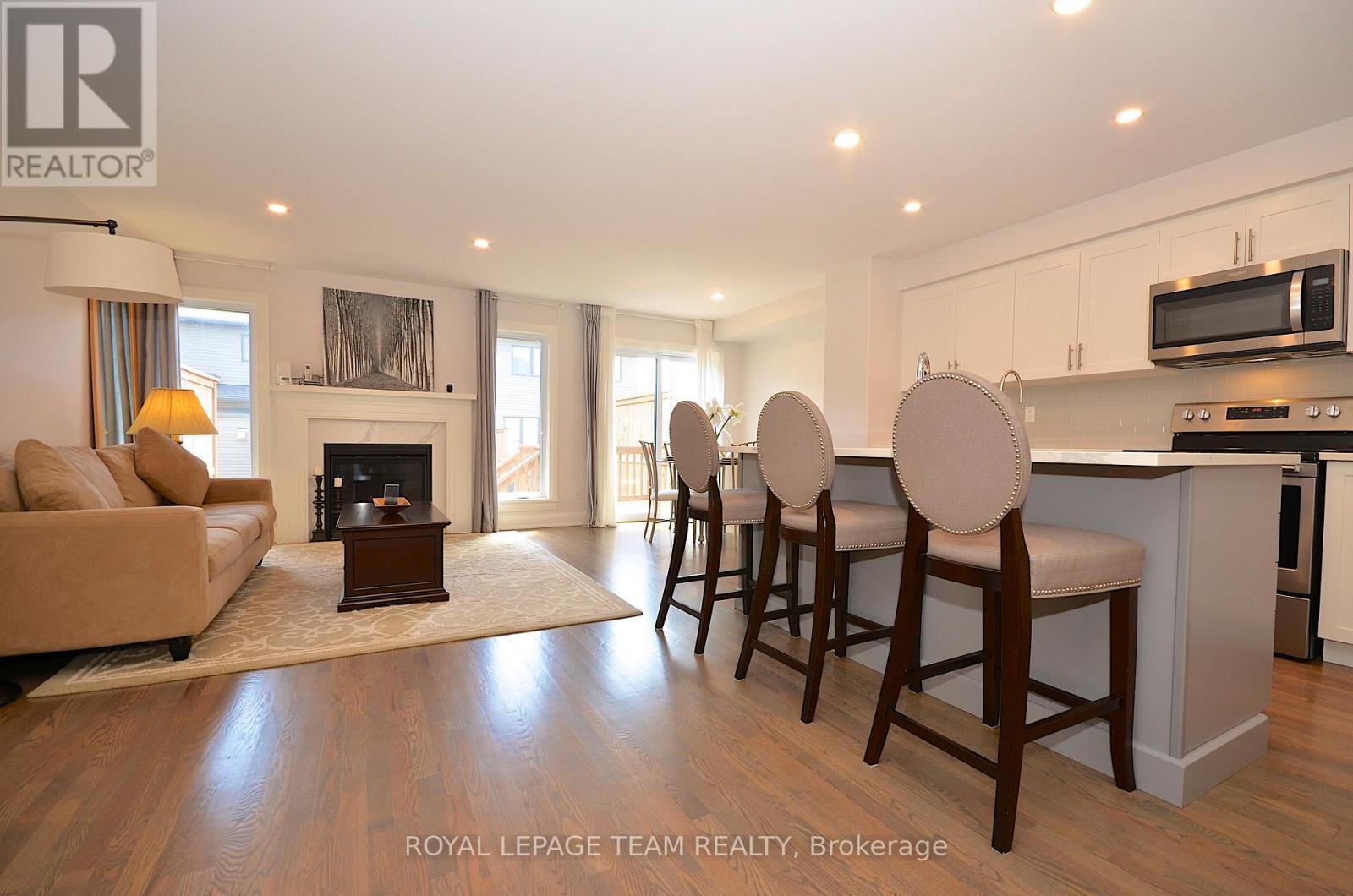 331 Proud Walk Drive Drive S, Ottawa, ON - Indoor Photo Showing Other Room With Fireplace