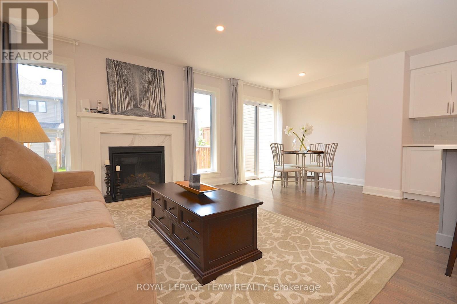 331 Proud Walk Drive Drive S, Ottawa, ON - Indoor Photo Showing Living Room With Fireplace