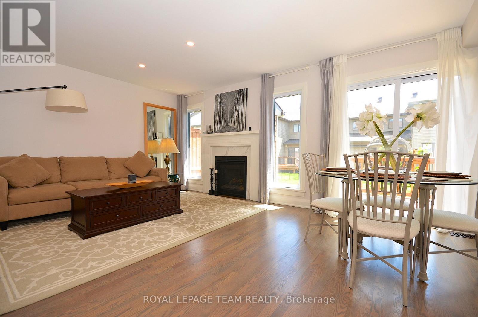 331 Proud Walk Drive Drive S, Ottawa, ON - Indoor Photo Showing Living Room With Fireplace