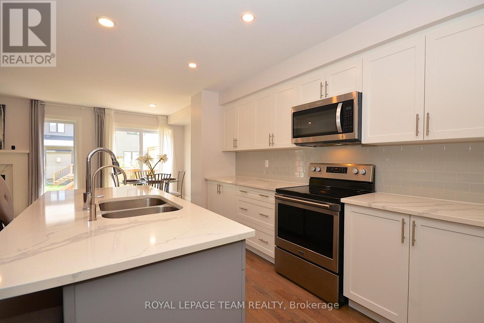 331 Proud Walk Drive Drive S, Ottawa, ON - Indoor Photo Showing Kitchen With Double Sink
