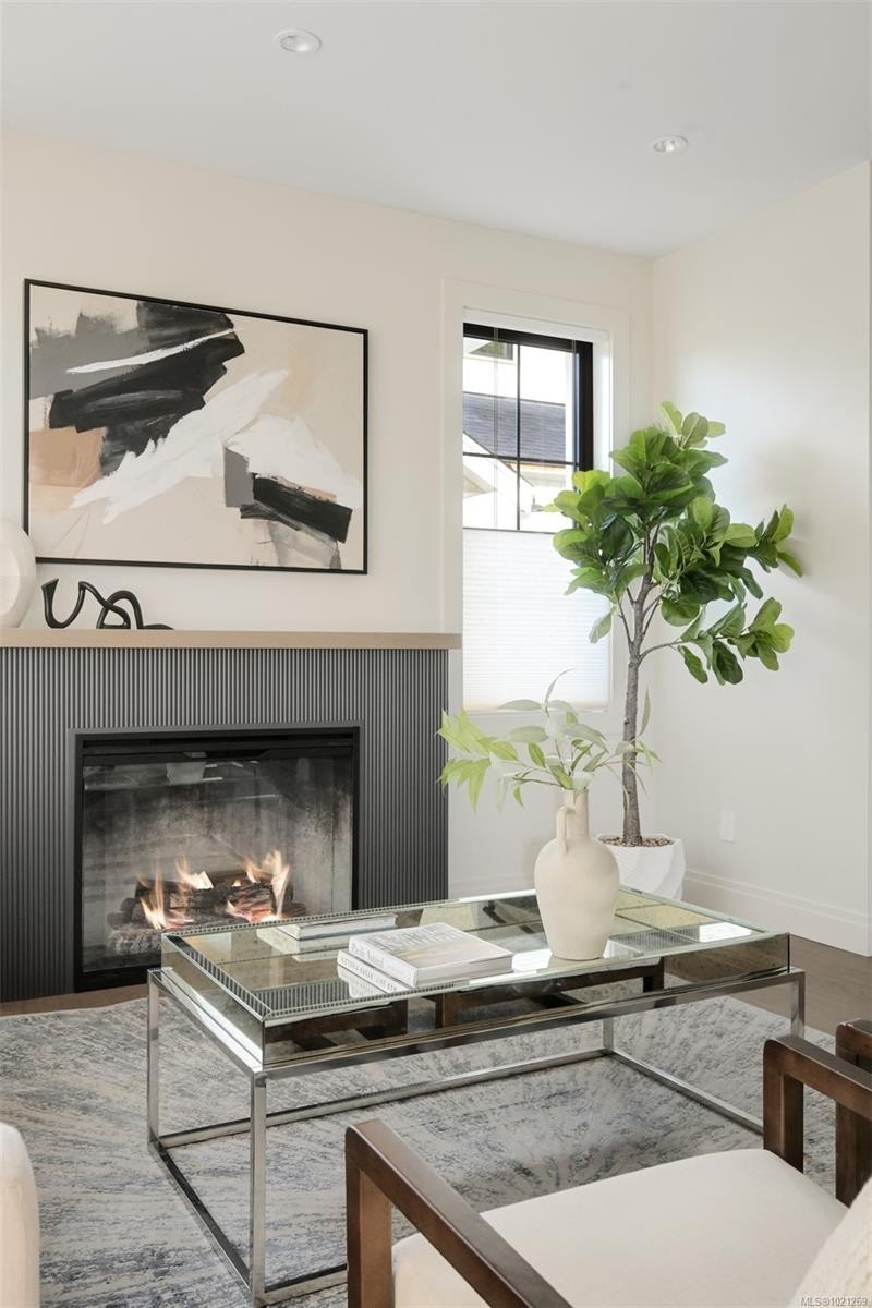 2-5032 Wesley Rd, Saanich, BC - Indoor Photo Showing Living Room With Fireplace