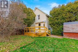 14x8 ft rear deck next to lilac grove -