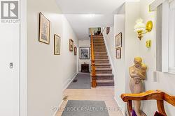 Front Foyer & staircase with gorgeous banister -