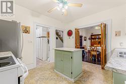 Doors open to dining area-laundry area is to left -