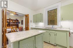 Dishwasher could be installed to right of ss sink -