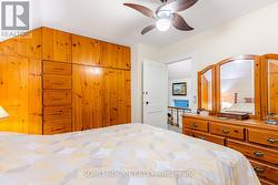 Bedroom with custom-made built-in closets/drawers -