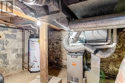 Natural gas furnace & ng hot water tank in bsmt -