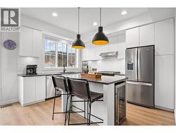 Open Kitchen with Wine Fridge -