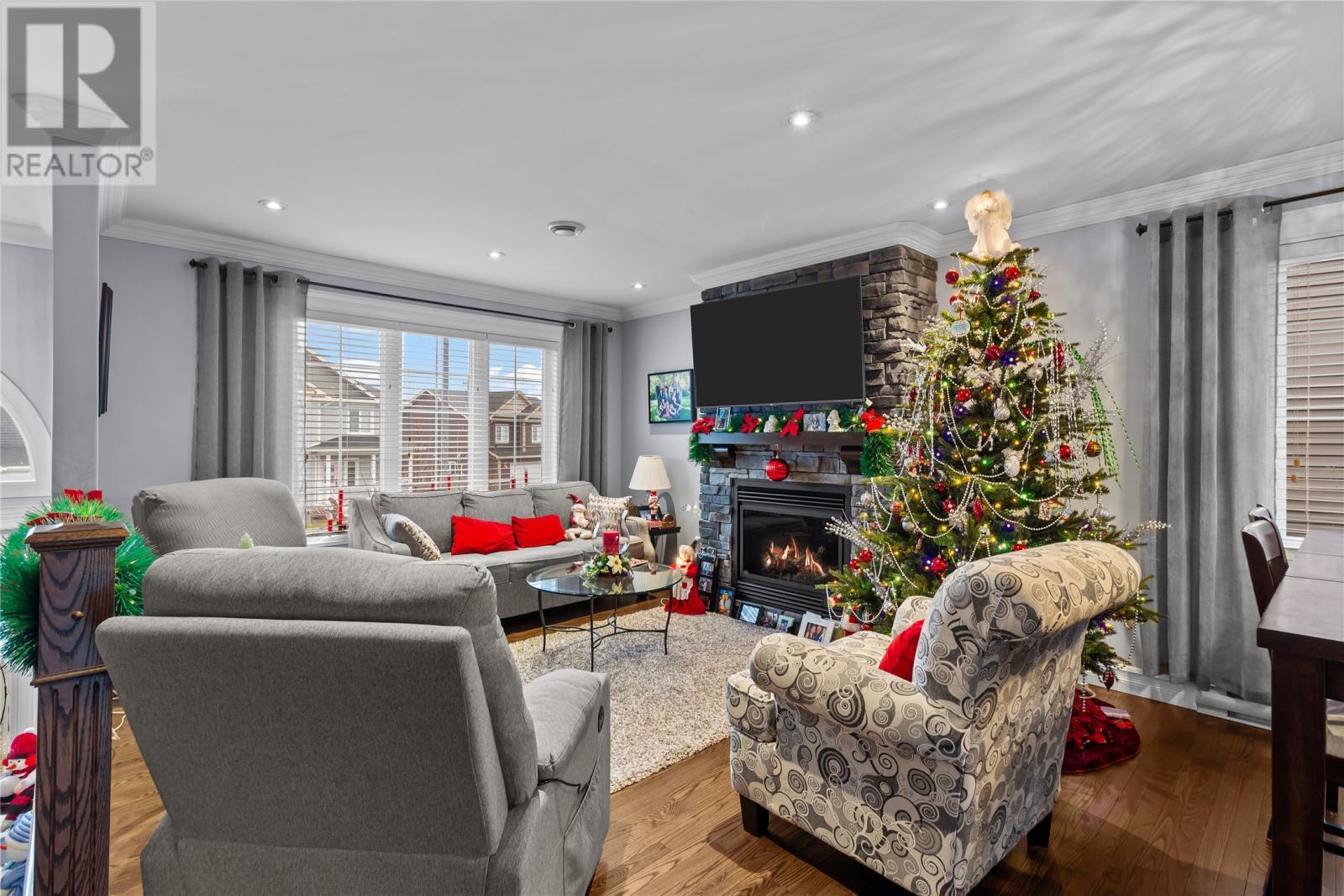 5 Lake Wynds Drive, Paradise, NL - Indoor Photo Showing Living Room With Fireplace