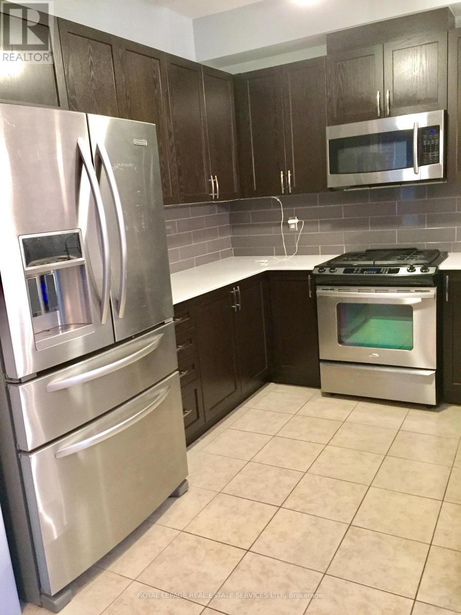 576 Murray Meadows Place, Milton, ON - Indoor Photo Showing Kitchen With Stainless Steel Kitchen
