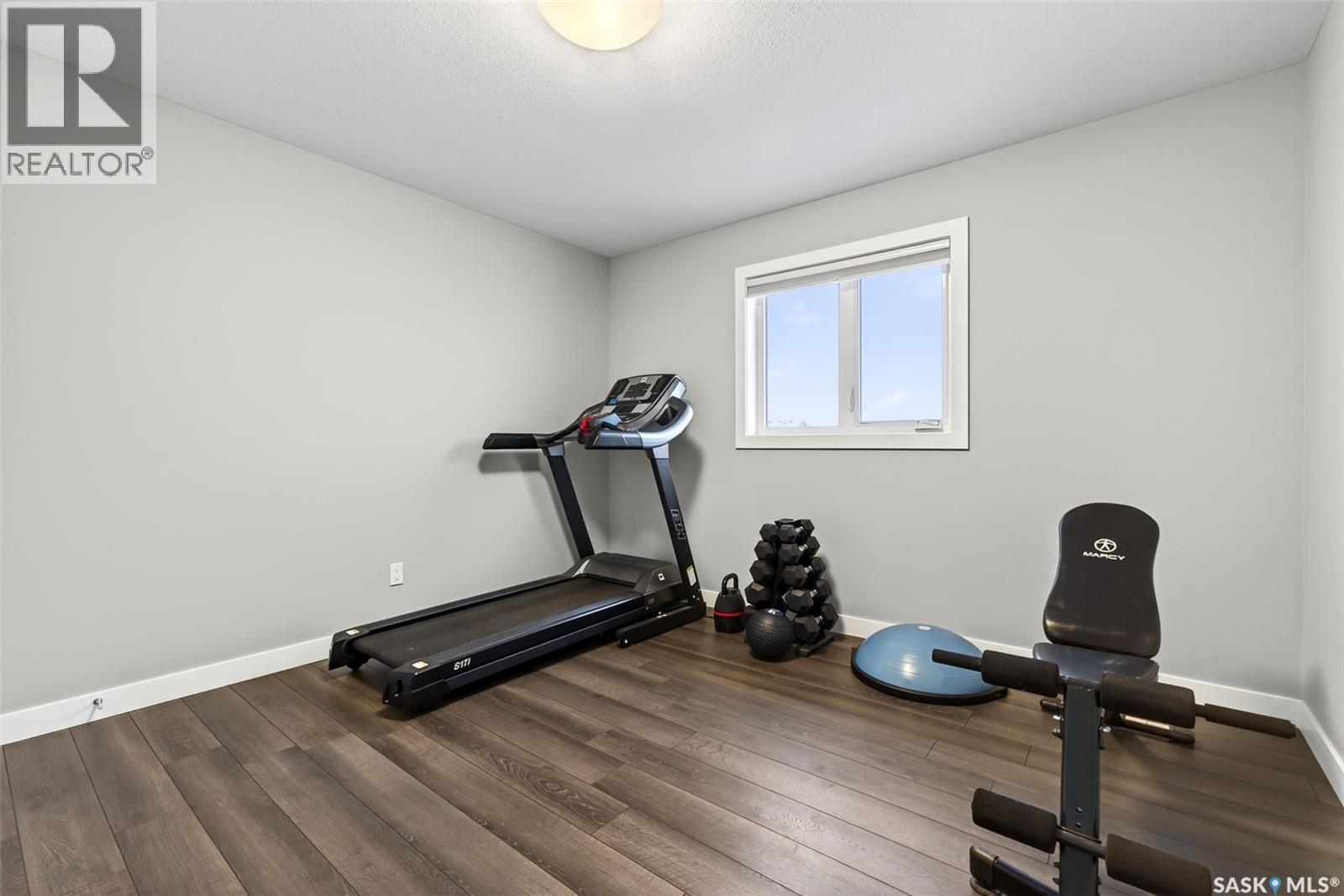 5669 Glide Crescent, Regina, SK - Indoor Photo Showing Gym Room
