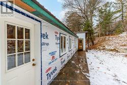 Main entrance to foyer + side entrance to kitchen -