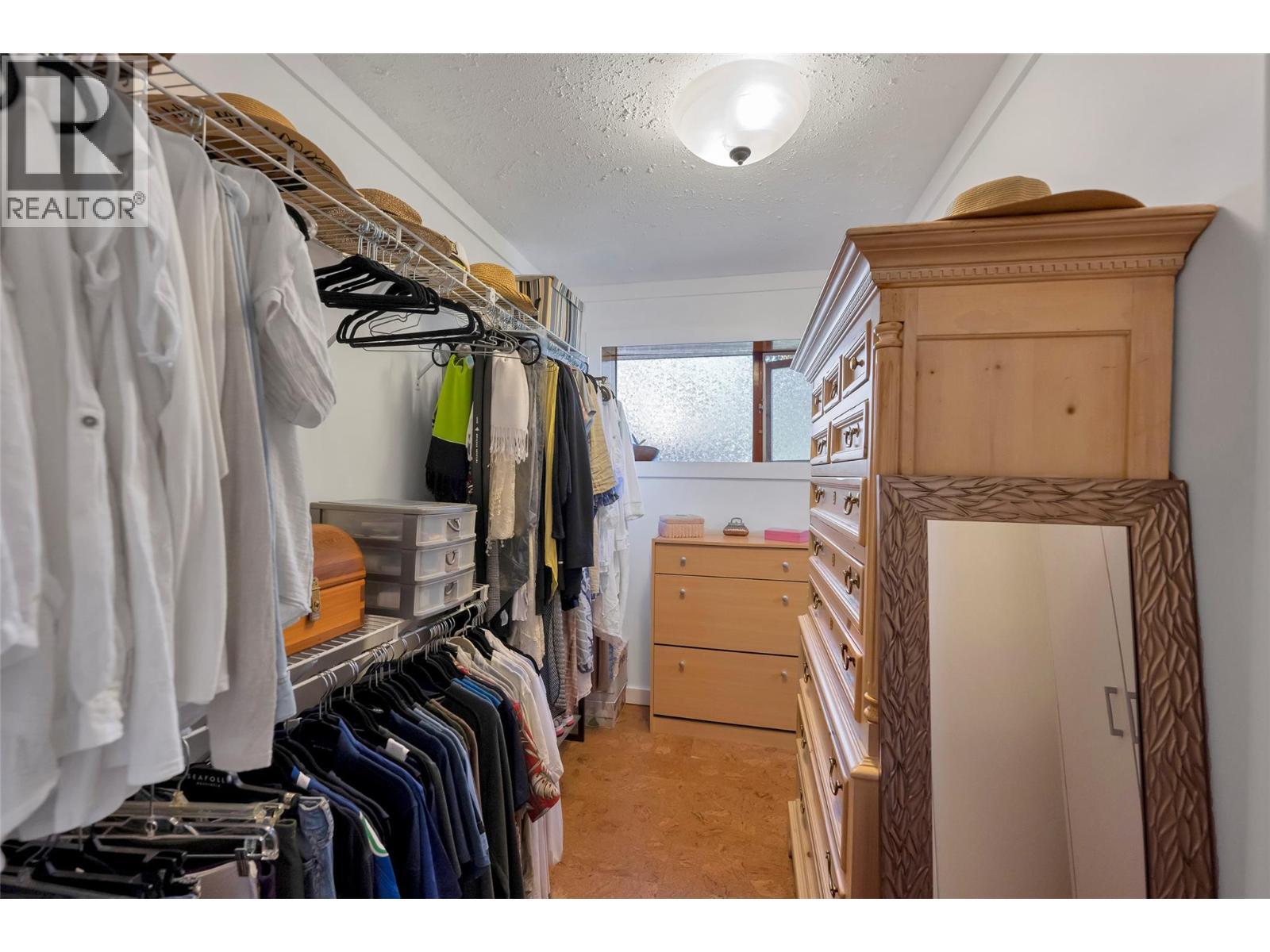 W-In Closet - 2726 Tranquil Place, Blind Bay, BC - Indoor With Storage