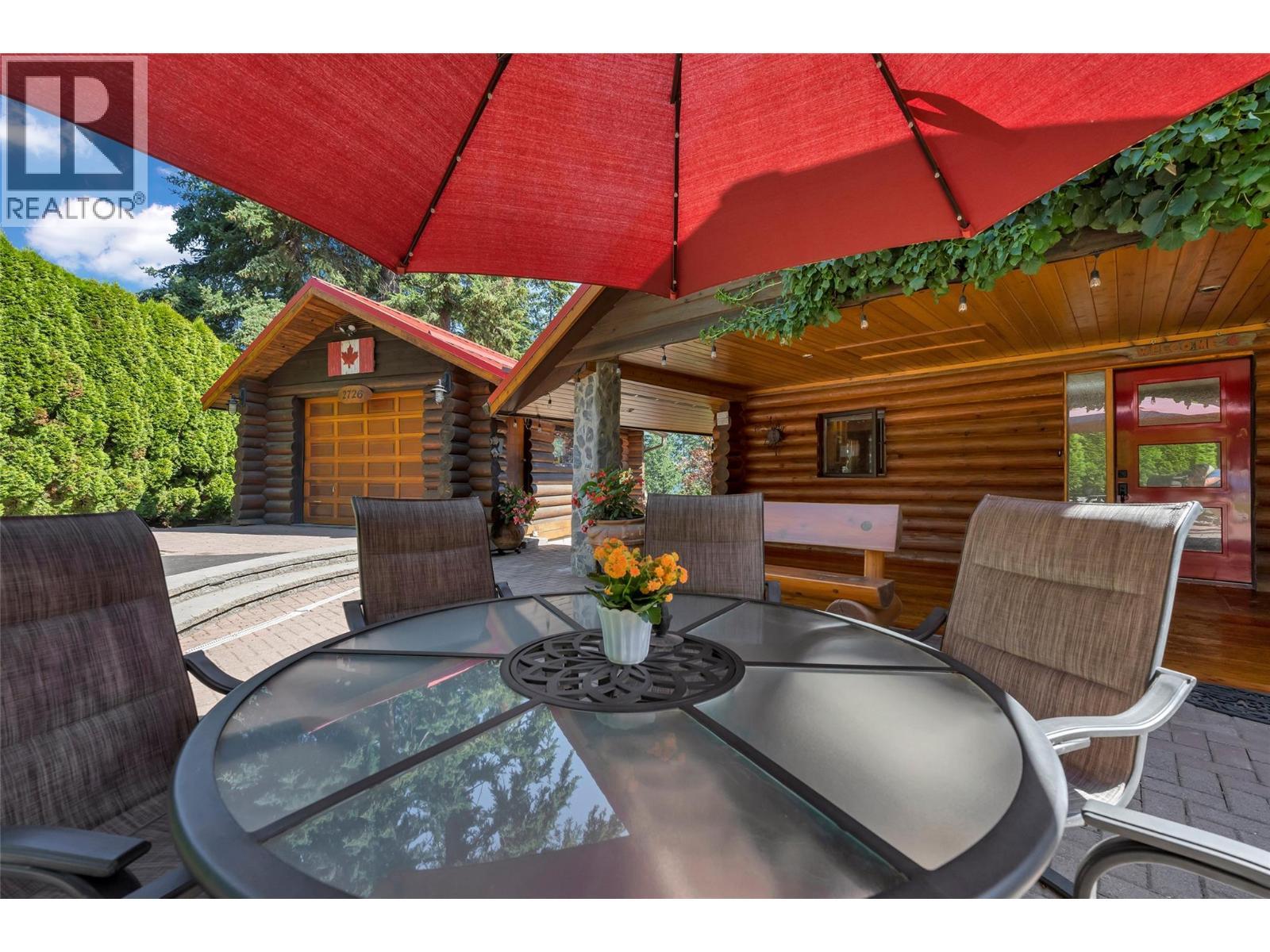 Relax on the patio - 2726 Tranquil Place, Blind Bay, BC - Outdoor With Deck Patio Veranda With Exterior