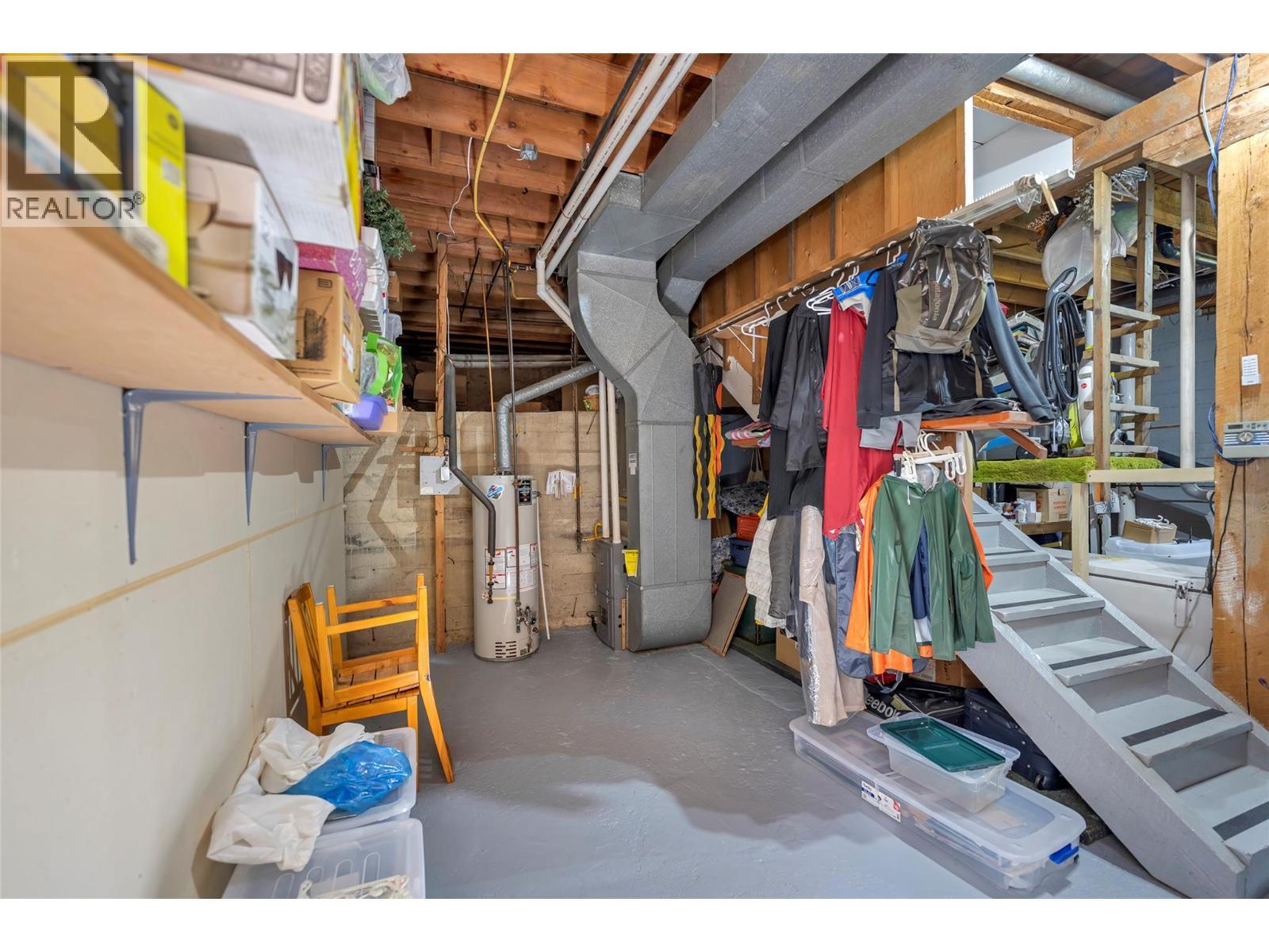 Basement utilities and tons of storage space! - 2726 Tranquil Place, Blind Bay, BC - Indoor Photo Showing Basement