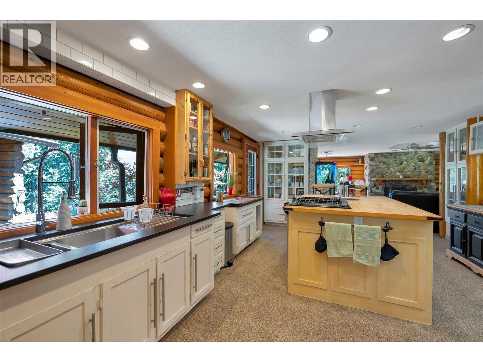Beautiful Kitchen with stainless steel appliances - 2726 Tranquil Place, Blind Bay, BC - Indoor Photo Showing Kitchen With Double Sink