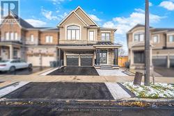 67 EBERLY WOODS DRIVE Caledon, ON L7C 4J3