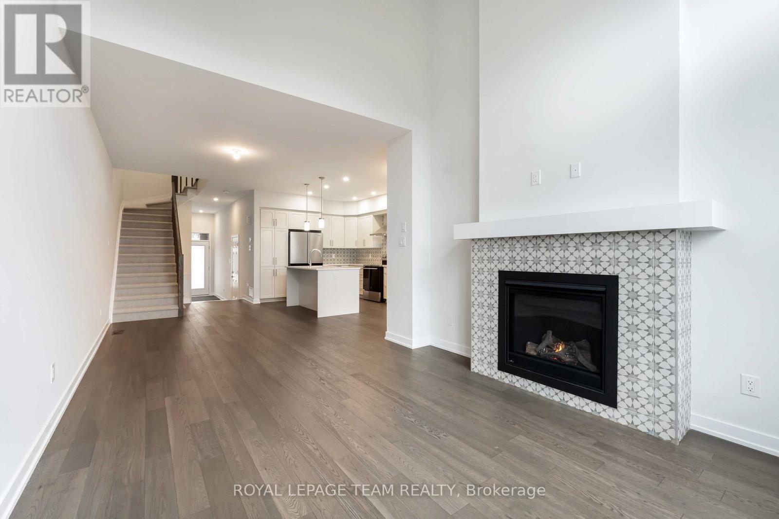 91 Gartersnake Way, Ottawa, ON - Indoor Photo Showing Living Room With Fireplace