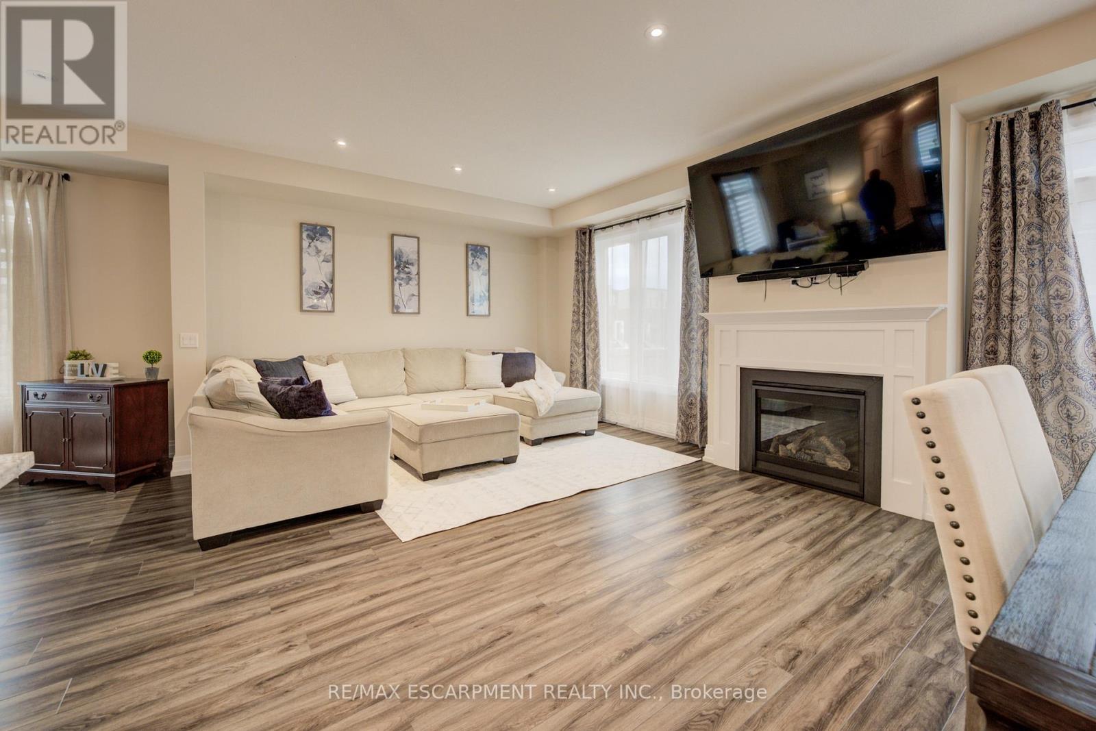 50 Kenesky Drive, Hamilton, ON - Indoor Photo Showing Living Room With Fireplace