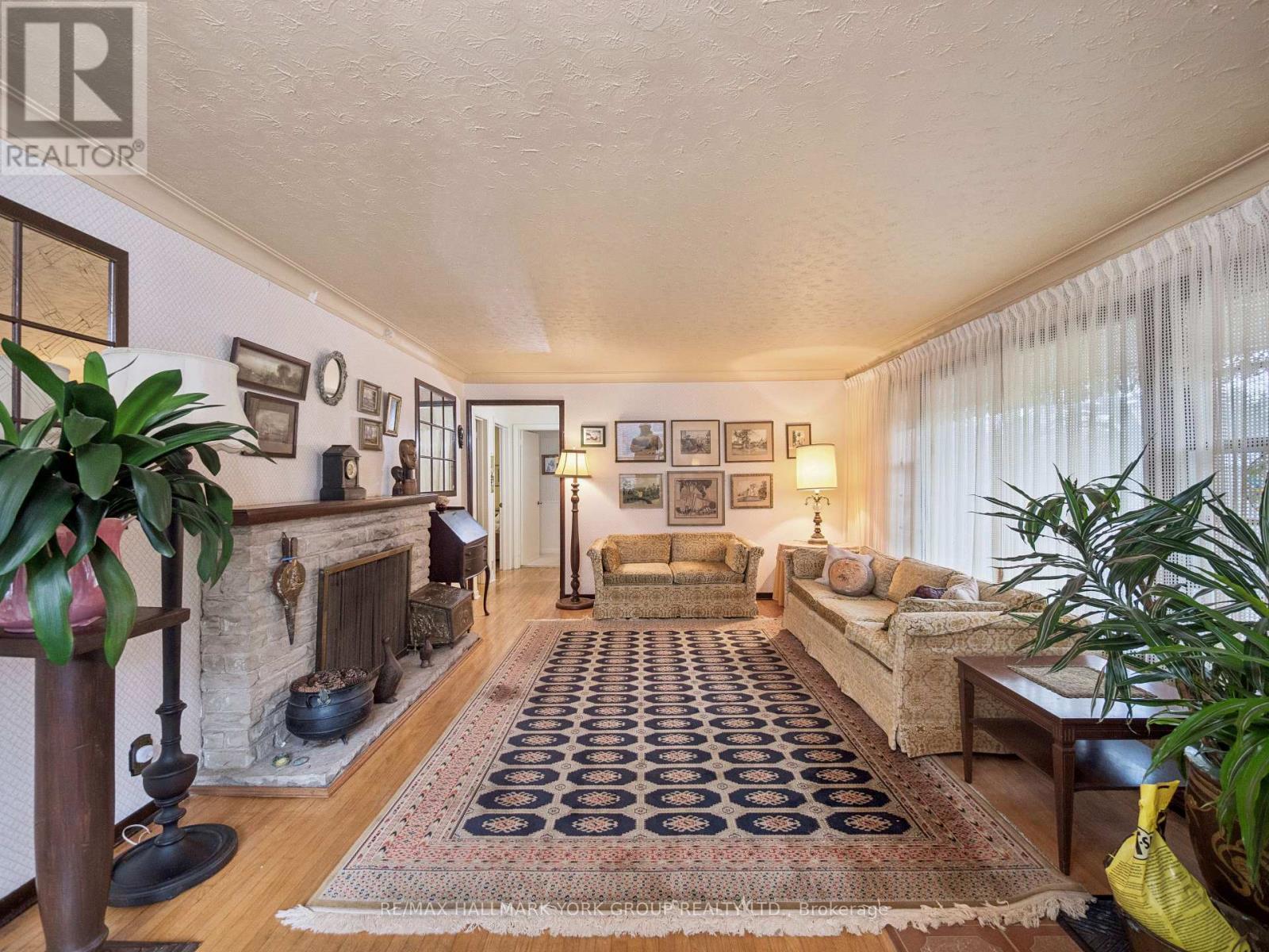 60 Charles Street, King, ON - Indoor Photo Showing Living Room With Fireplace