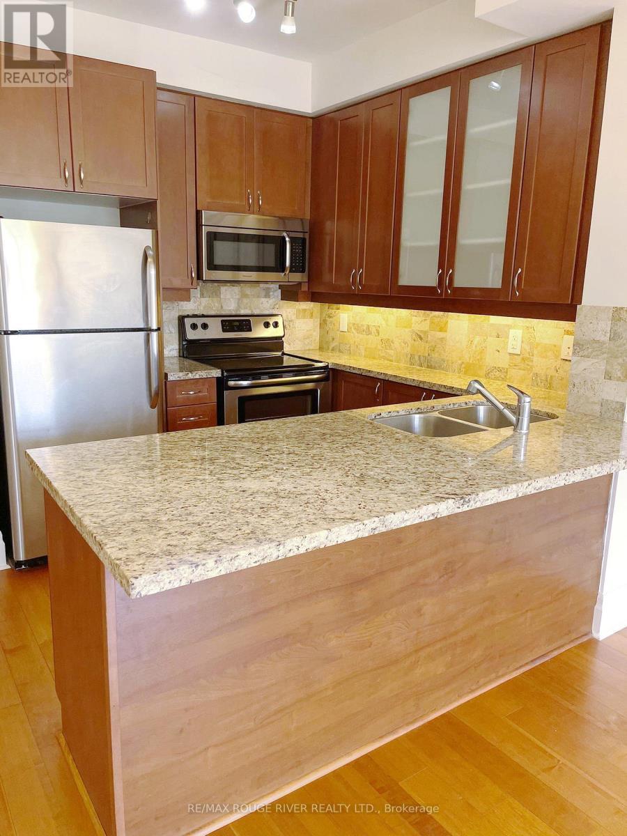 319 - 111 Upper Duke Crescent, Markham, ON - Indoor Photo Showing Kitchen With Stainless Steel Kitchen With Double Sink