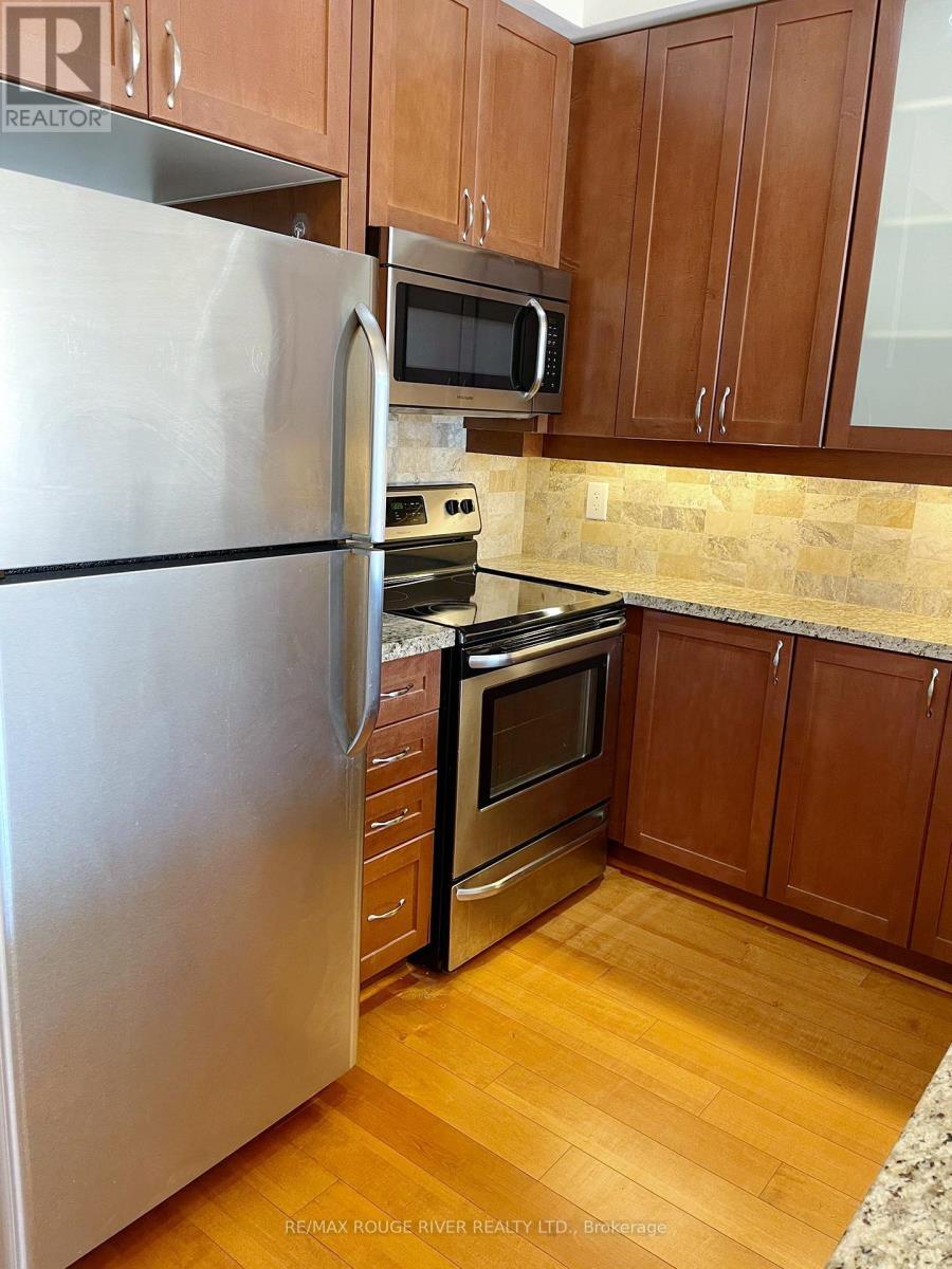 319 - 111 Upper Duke Crescent, Markham, ON - Indoor Photo Showing Kitchen With Stainless Steel Kitchen