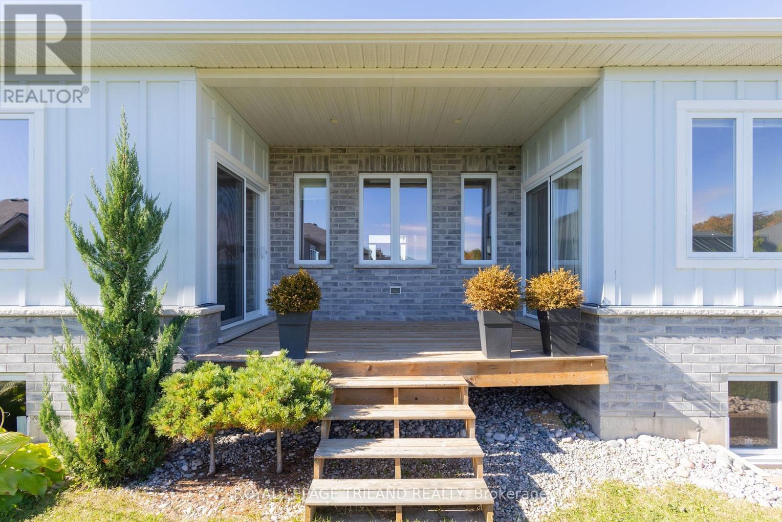 Backyard covered sundeck off kitchen - 26 Tattersall Lane, Lambton Shores (Grand Bend), ON - Outdoor