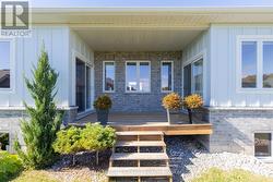 Backyard covered sundeck off kitchen -
