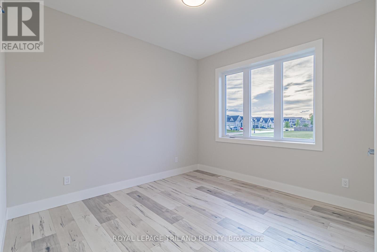 2nd main level bedroom - 26 Tattersall Lane, Lambton Shores (Grand Bend), ON - Indoor Photo Showing Other Room