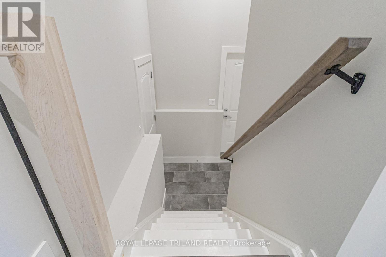 Onto mid-level mudroom - 26 Tattersall Lane, Lambton Shores (Grand Bend), ON - Indoor Photo Showing Other Room