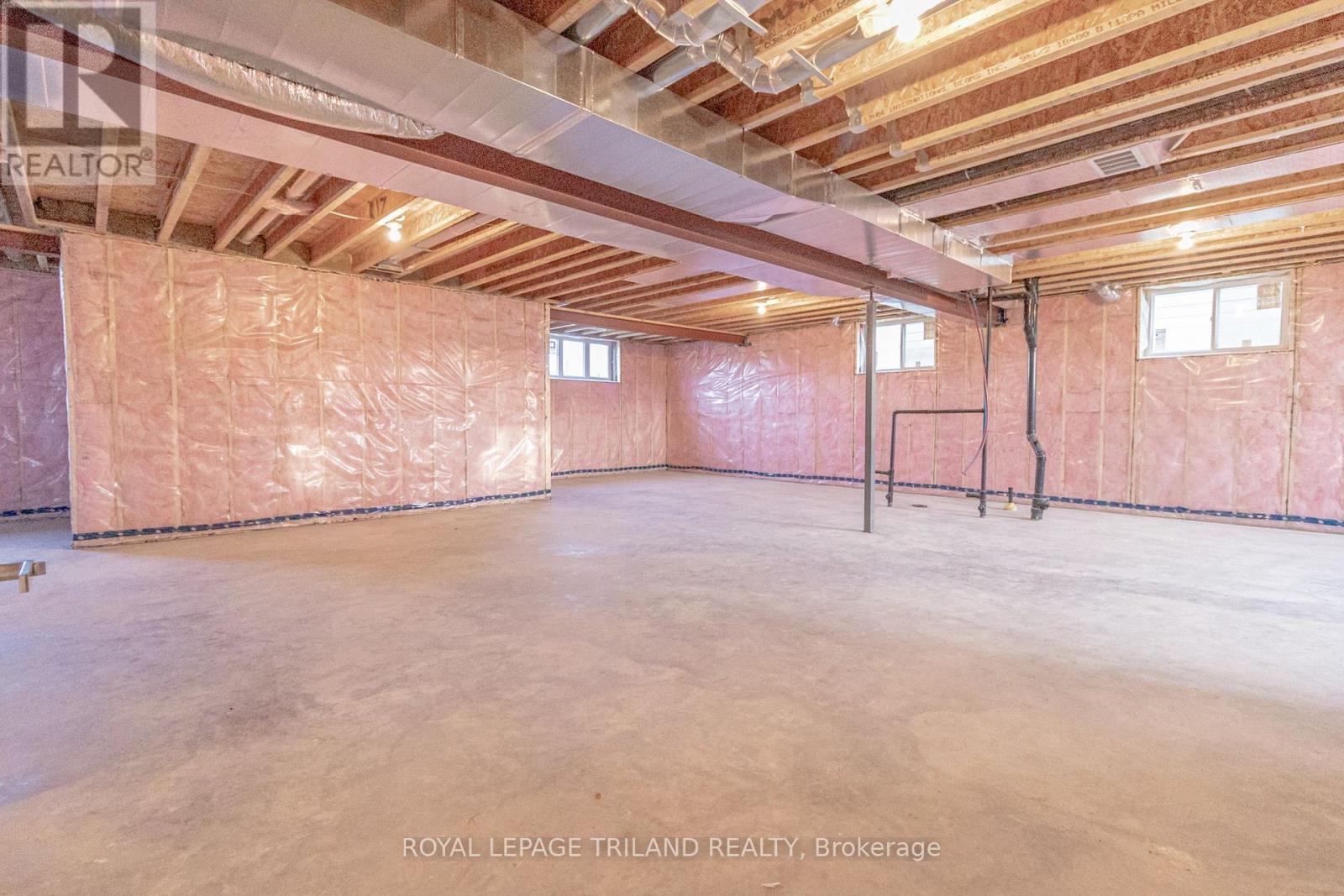 Lower below 9ft ceilings + roughed-in bath/kitchen - 26 Tattersall Lane, Lambton Shores (Grand Bend), ON - Indoor Photo Showing Basement