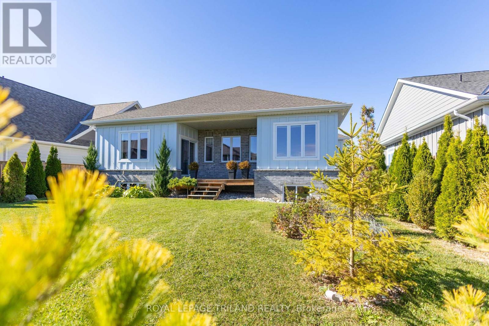 More of this superb exterior & backyard - 26 Tattersall Lane, Lambton Shores (Grand Bend), ON - Outdoor With Deck Patio Veranda