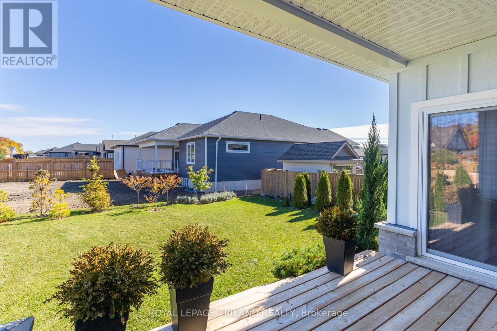 More of this superb exterior & backyard - 26 Tattersall Lane, Lambton Shores (Grand Bend), ON - Outdoor With Deck Patio Veranda With Exterior
