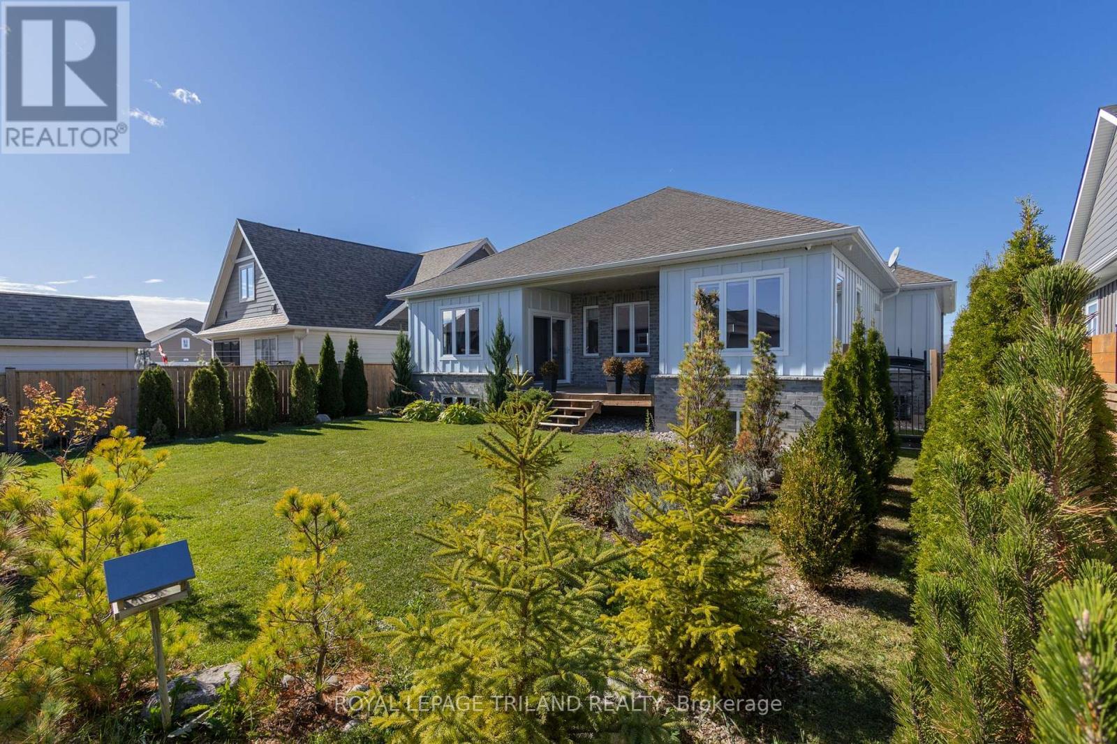 More of this superb exterior & backyard - 26 Tattersall Lane, Lambton Shores (Grand Bend), ON - Outdoor With Deck Patio Veranda