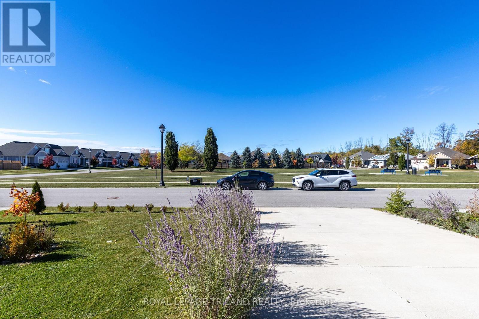 Ideally located across from permanent green space - 26 Tattersall Lane, Lambton Shores (Grand Bend), ON - Outdoor With View