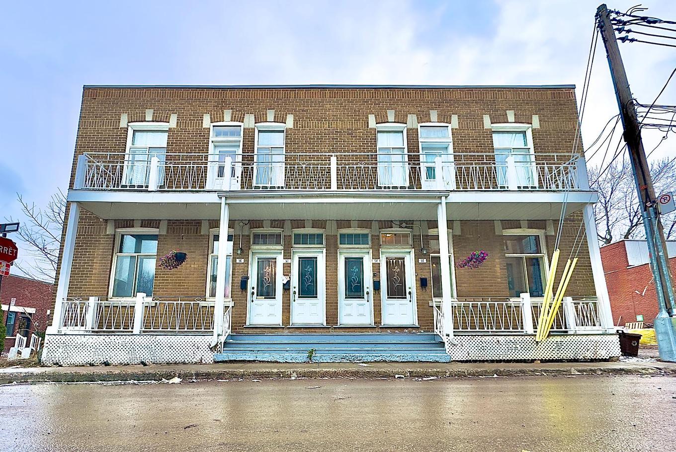 Façade - 56 Rue Ste-Anne, Montréal (Rivière-Des-Prairies/Pointe-Aux-Trembles), QC - Outdoor With Deck Patio Veranda With Facade