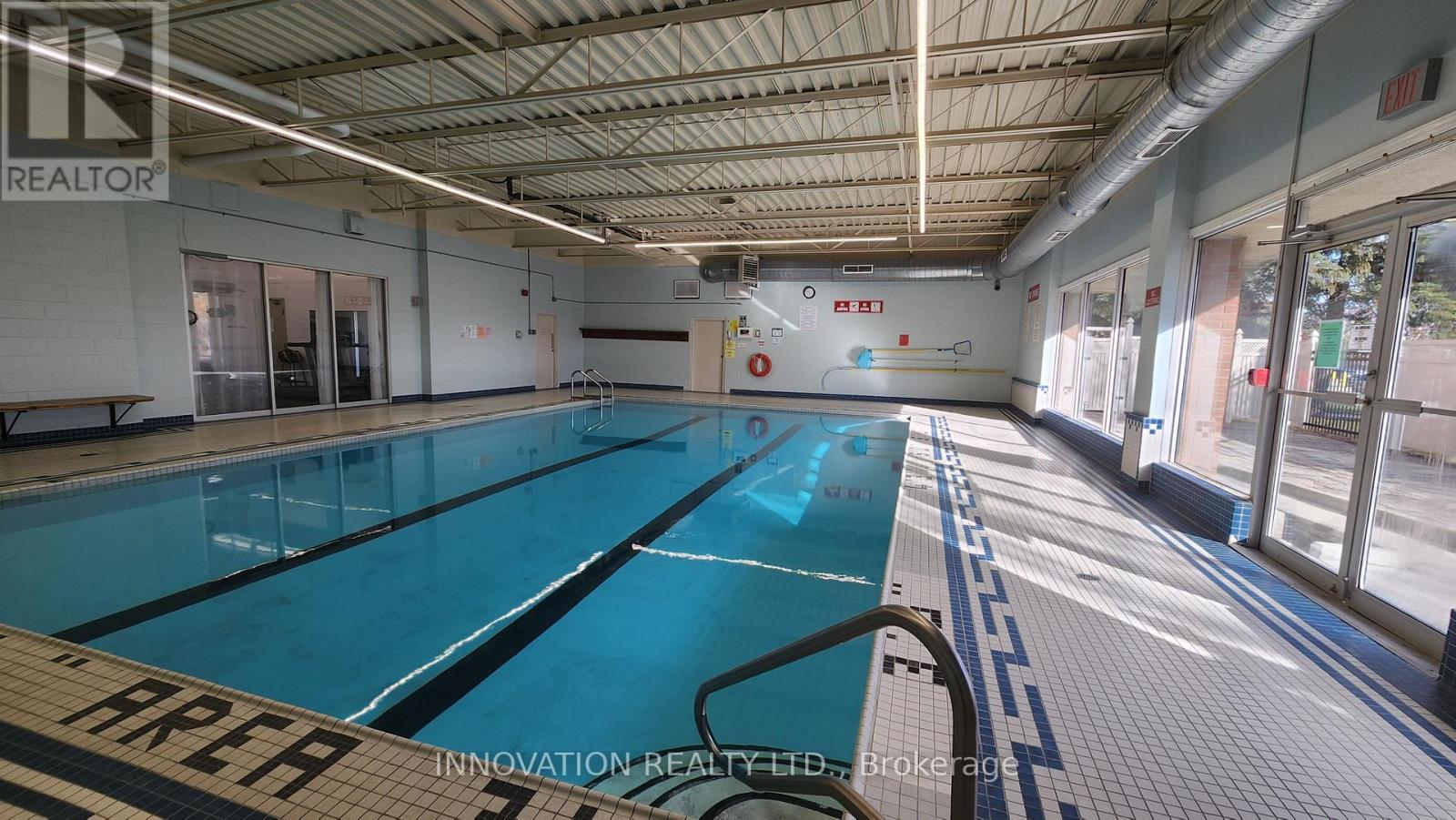 1406 - 2020 Jasmine Crescent, Ottawa, ON - Indoor Photo Showing Other Room With In Ground Pool