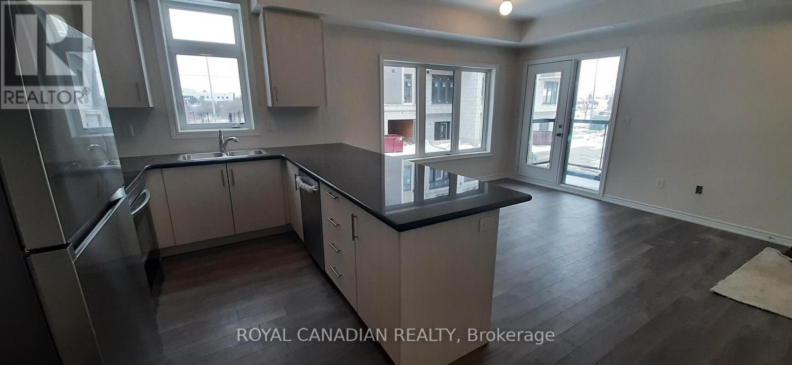 49 - 40 Halliford Place, Brampton, ON - Indoor Photo Showing Kitchen With Double Sink