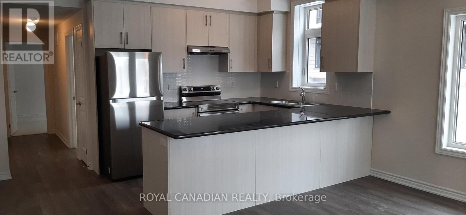 49 - 40 Halliford Place, Brampton, ON - Indoor Photo Showing Kitchen With Double Sink