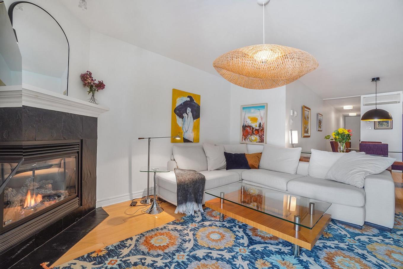 Living room - 5-36 Ch. Du Tour-Du-Lac, Sainte-Agathe-Des-Monts, QC - Indoor Photo Showing Living Room With Fireplace