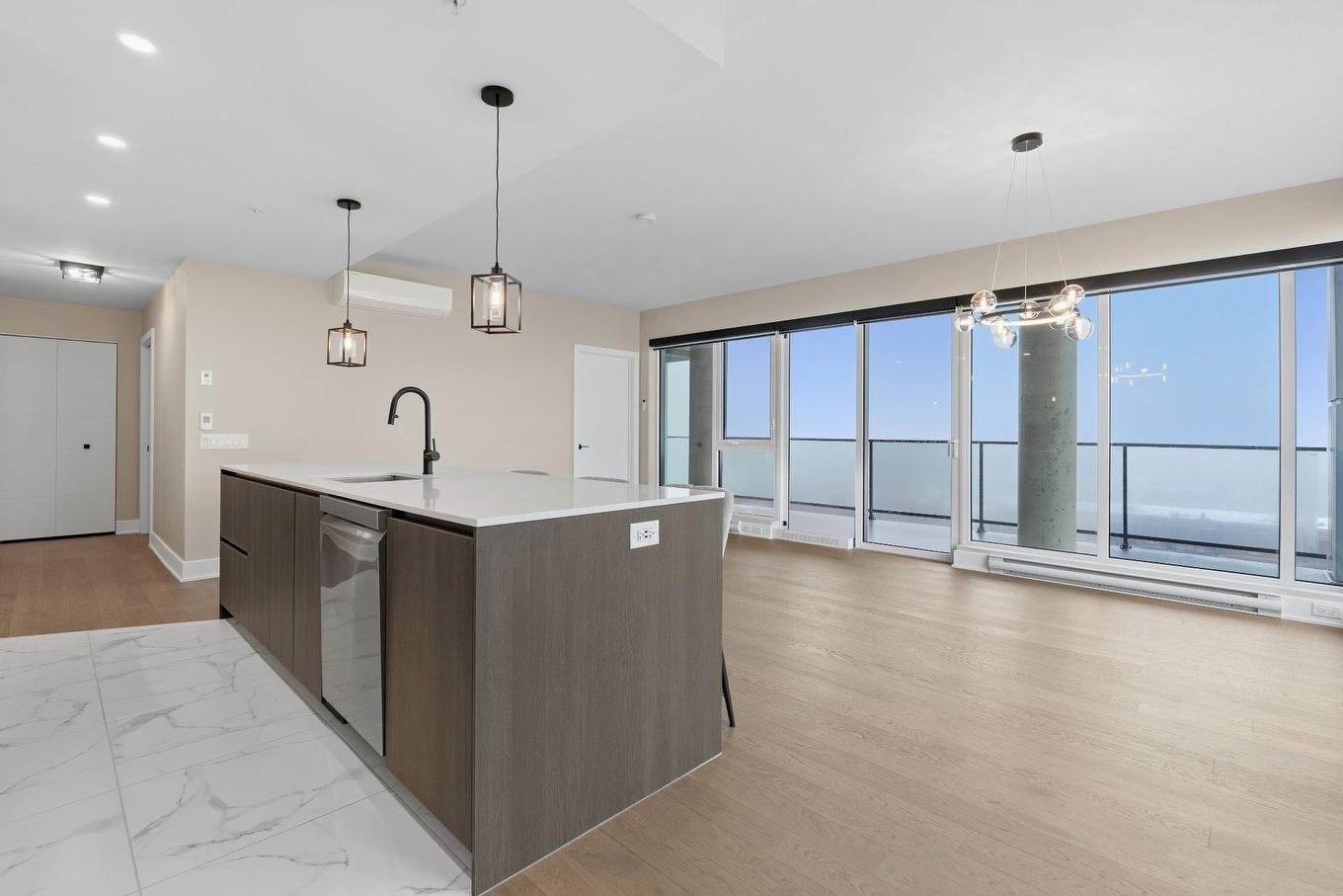 Vue d'ensemble - 1202-2835 Av. Du Cosmodôme, Laval (Chomedey), QC - Indoor Photo Showing Kitchen