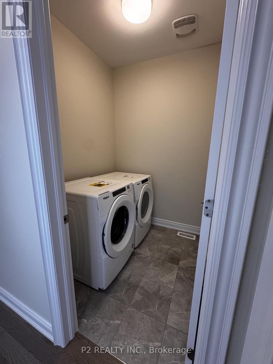 25 Periwinkle Road, Springwater, ON - Indoor Photo Showing Laundry Room