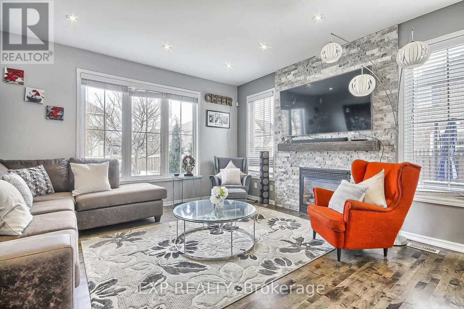 864 Etherington Way, Milton, ON - Indoor Photo Showing Living Room With Fireplace