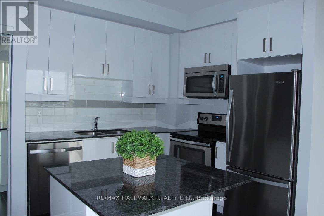 420 - 2900 Highway 7 Road, Vaughan, ON - Indoor Photo Showing Kitchen With Double Sink With Upgraded Kitchen