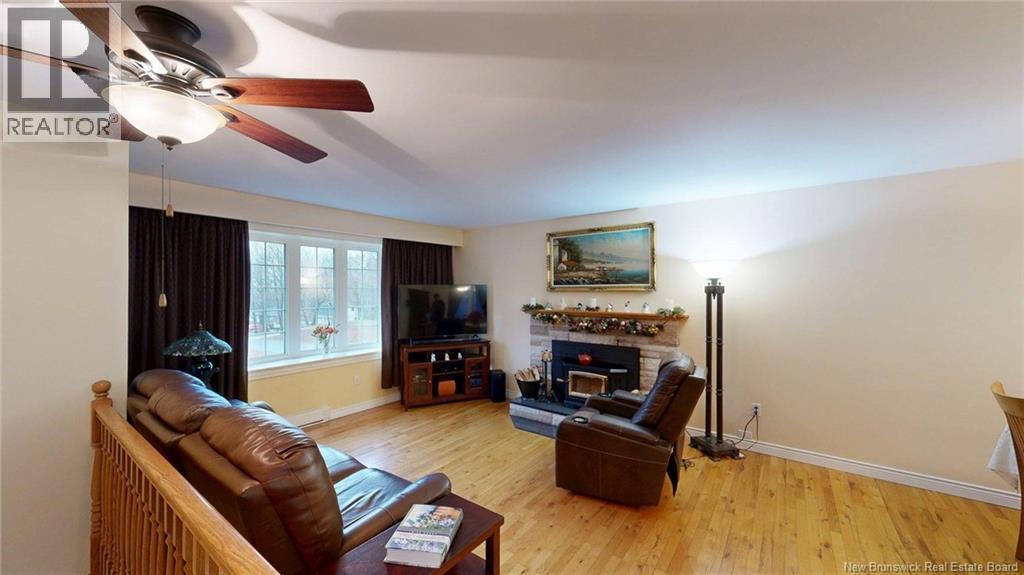 12 Ian Crescent, Rothesay, NB - Indoor Photo Showing Living Room With Fireplace
