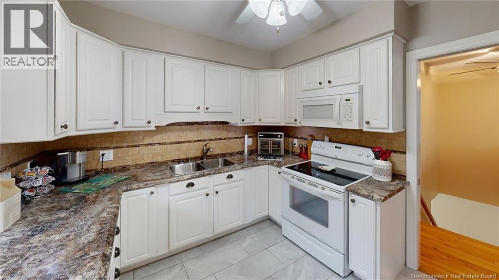 12 Ian Crescent, Rothesay, NB - Indoor Photo Showing Kitchen With Double Sink