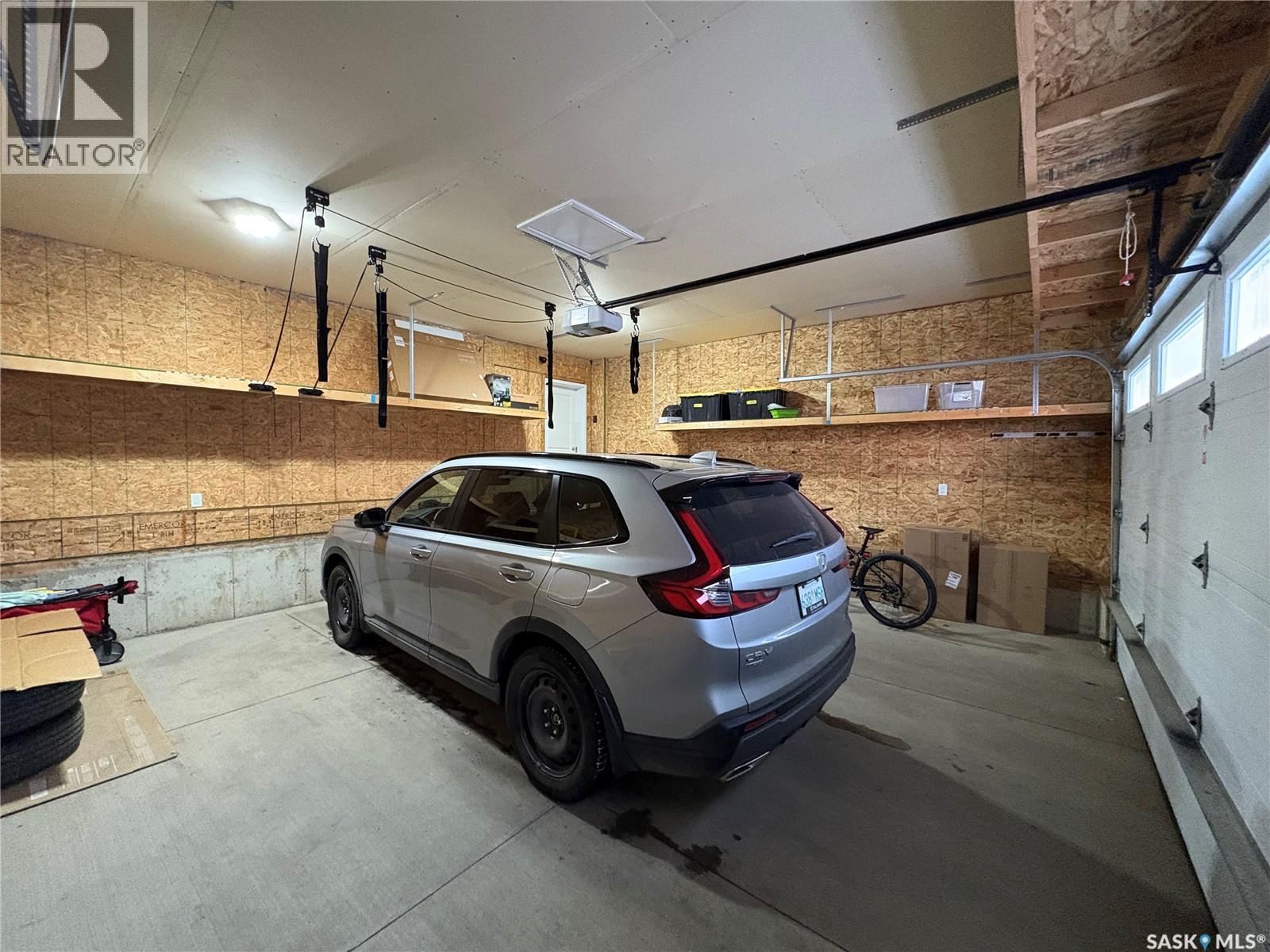 4301 Green Poplar Lane, Regina, SK - Indoor Photo Showing Garage