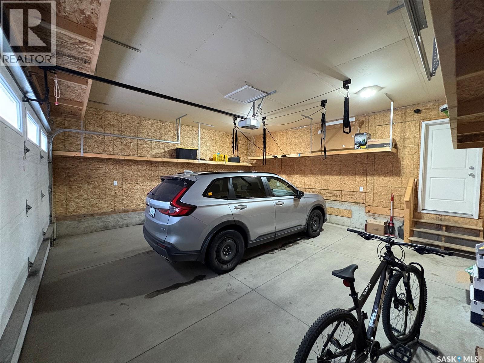 4301 Green Poplar Lane, Regina, SK - Indoor Photo Showing Garage
