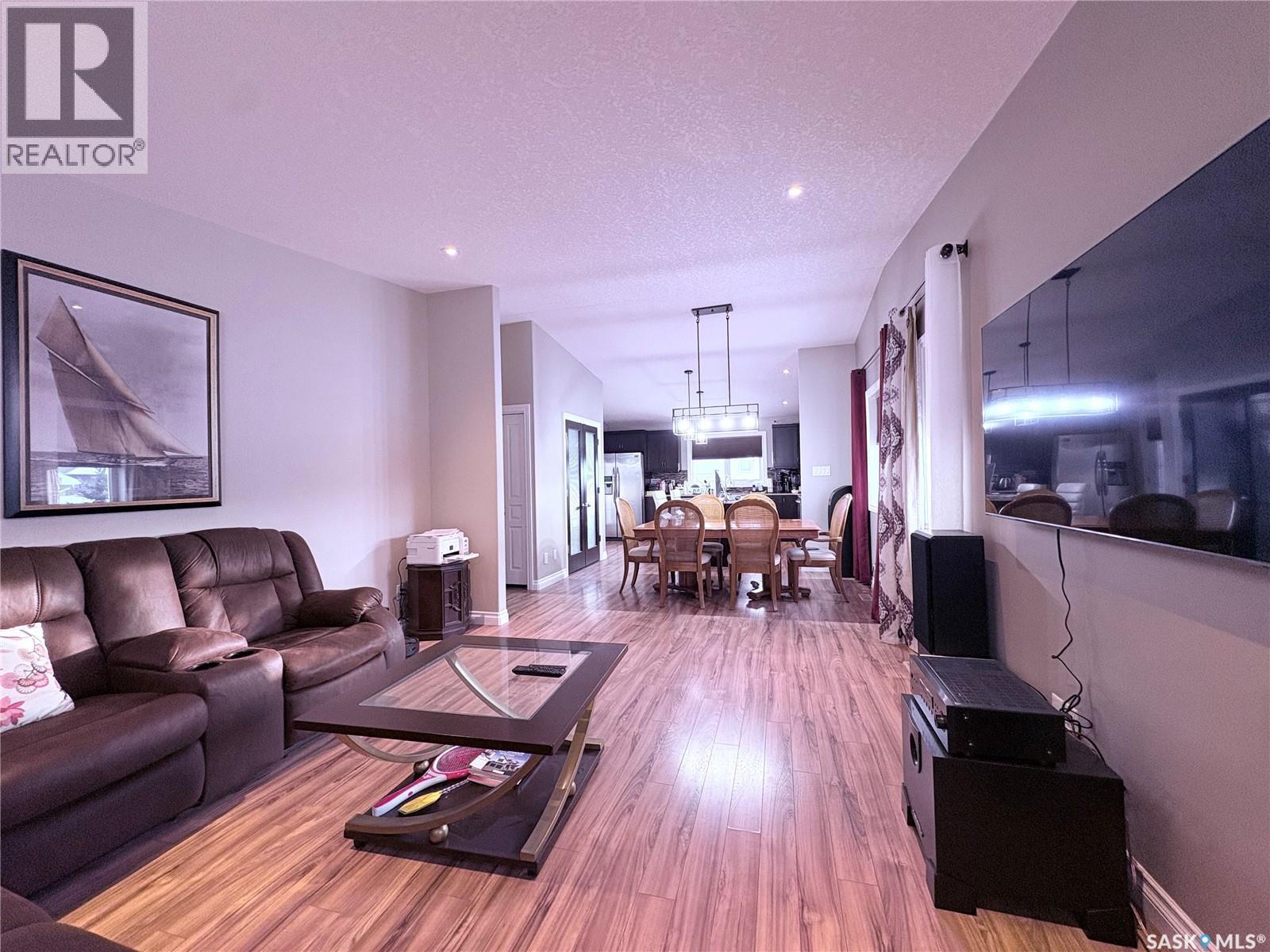 4301 Green Poplar Lane, Regina, SK - Indoor Photo Showing Living Room