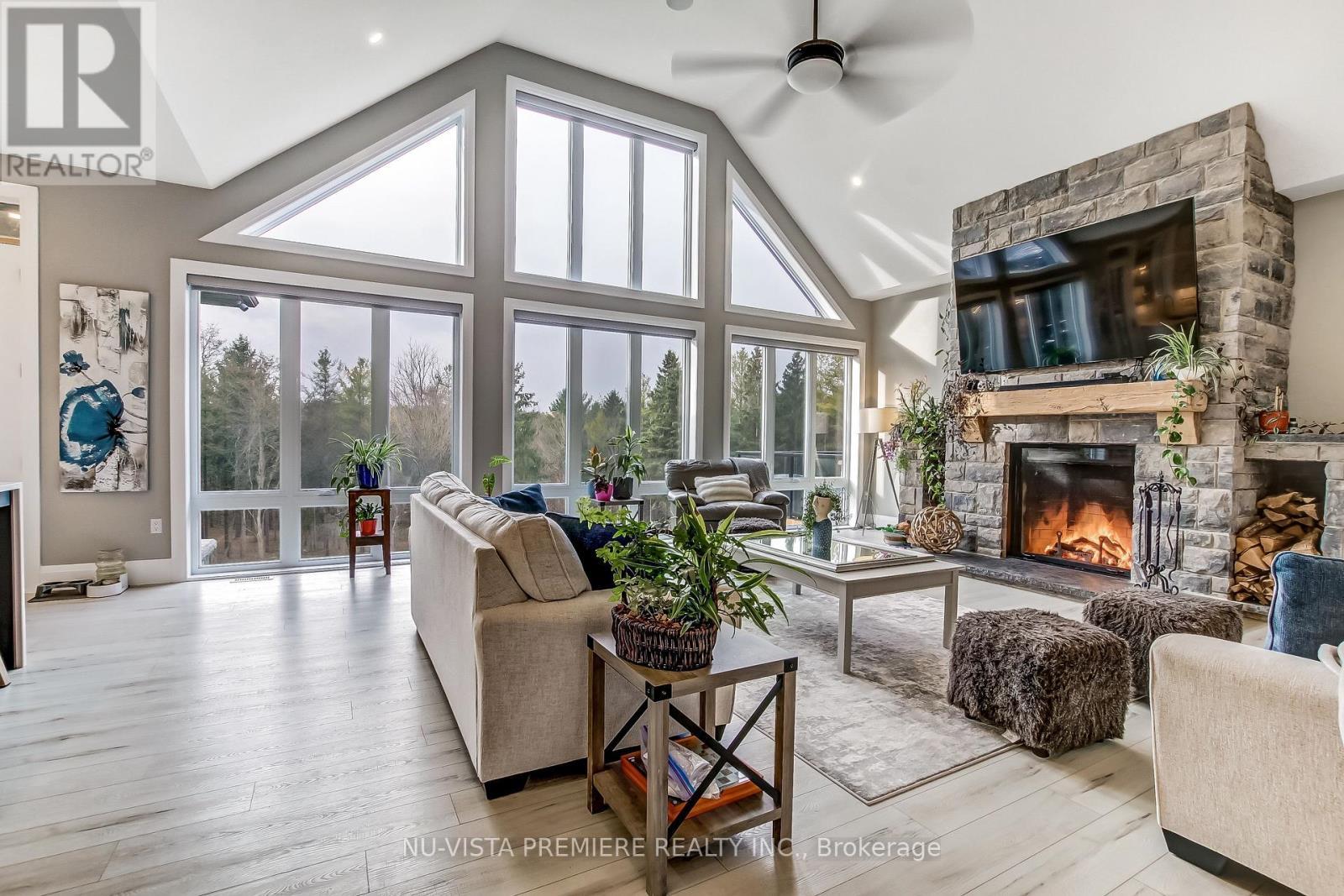 5233 Line 2 Line, Perth South (Blanshard), ON - Indoor Photo Showing Living Room With Fireplace